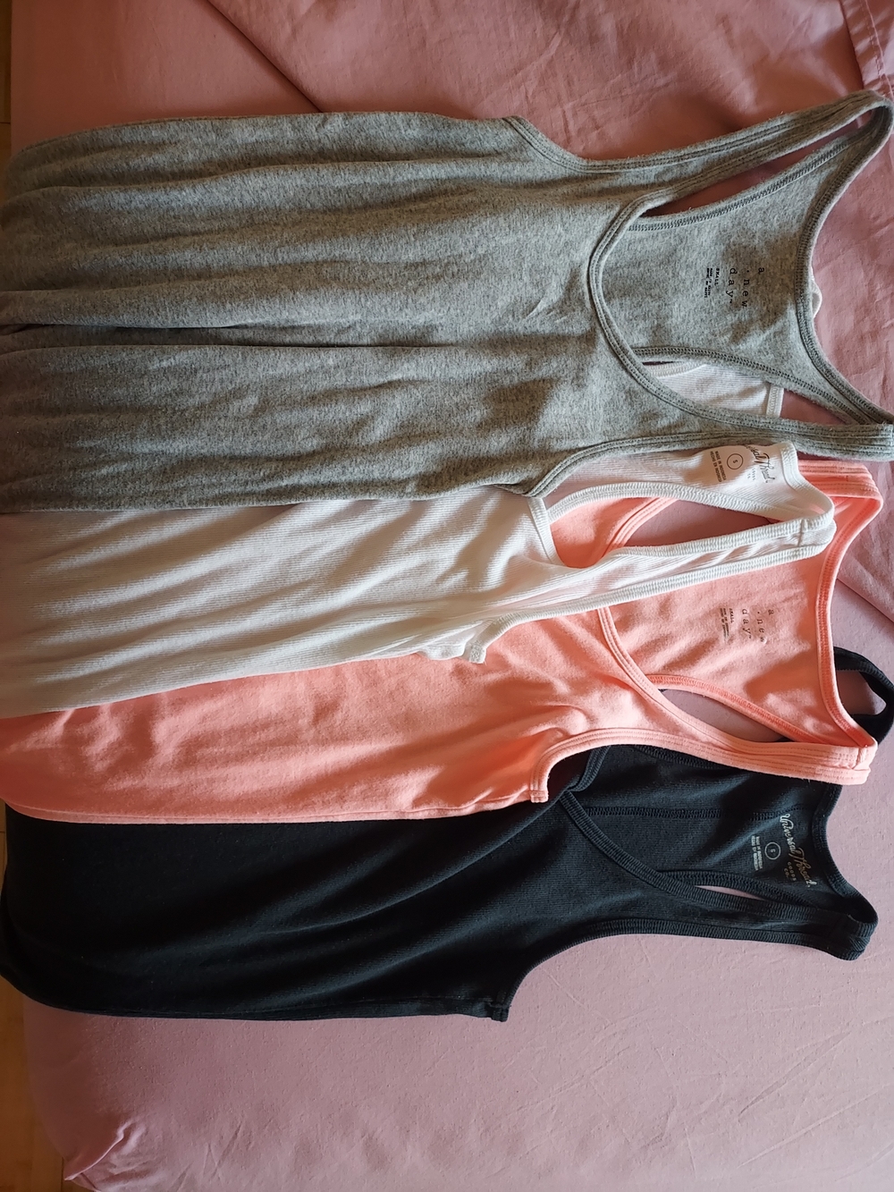 4 Womens Racerback Tanks. 2 Universal Thread. 2 A New Day. Perfect for everyday